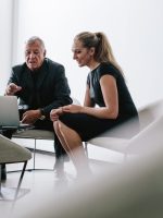 Group,Of,Business,People,Meeting,In,Office,Foyer.,Business,Team